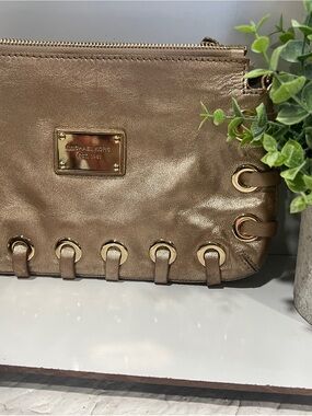Michael Kors Metallic Gold Leather Wristlet Clutch with Eyelet Detail